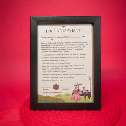 Framed playful 'Love Agreement' for couples by Radiate on a red background