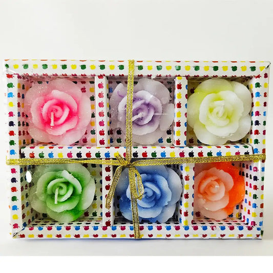 Set of colorful rose-shaped floating flower candles in a box