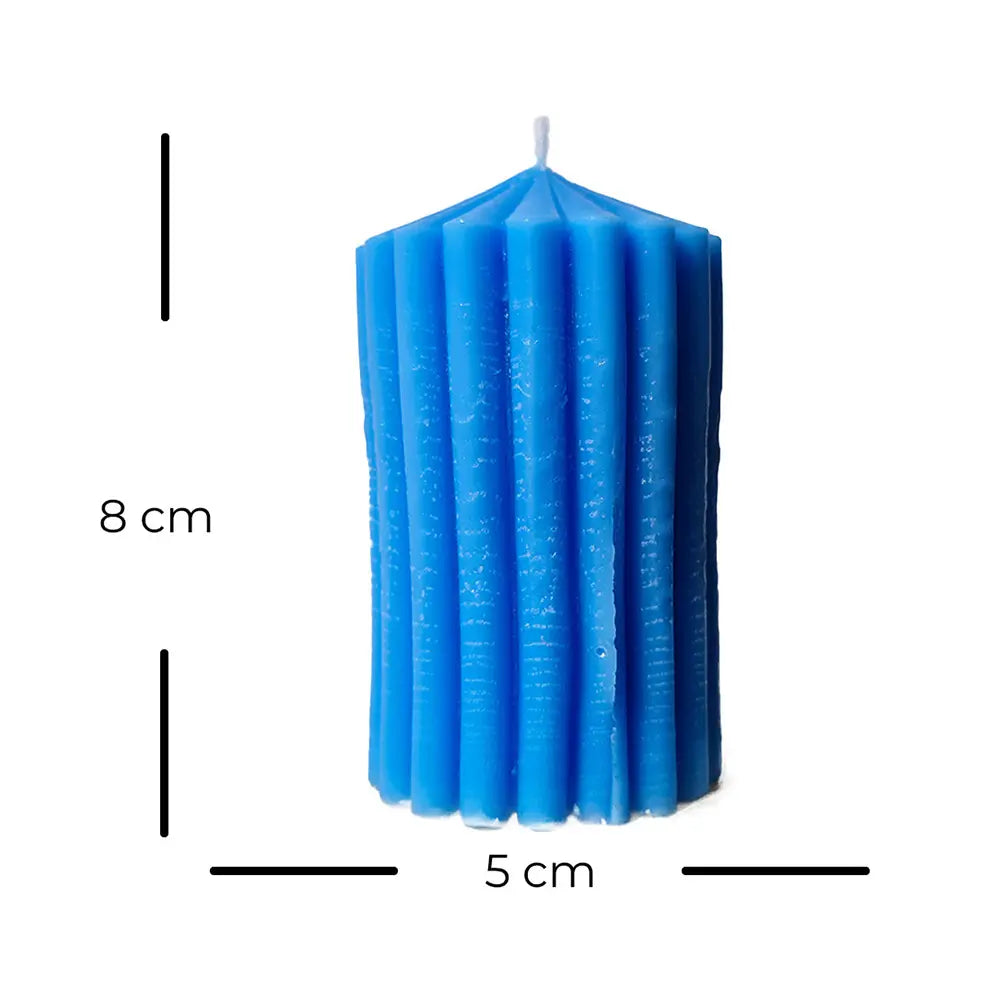 Blue ribbed candle with measurements on a white background
